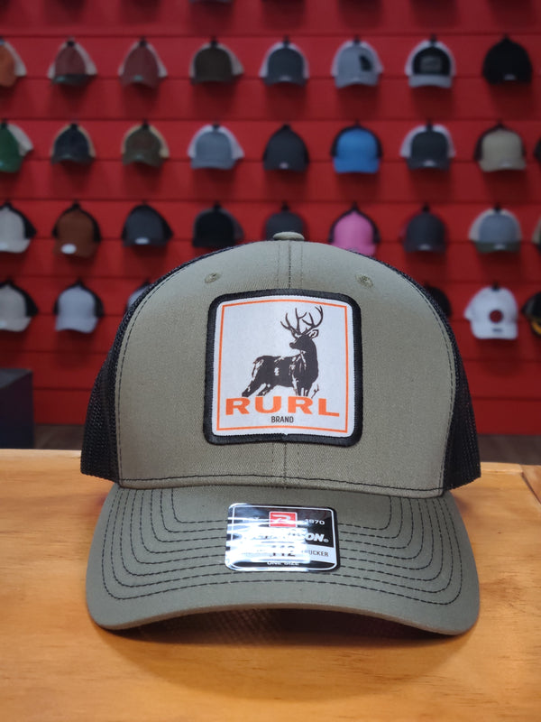 The RURL Buck Low Profile Trucker Hat
